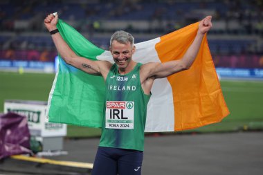 Rome, Italy 7.06.2024:   Christopher O'DONNELL, Rhasidat ADELEKE, Thomas BARR, Sharlene MAWDSLEY of Ireland win gold medal in  4 x 400m Relay Mixed Final  European Athletics Championships 2024 at Olympic Stadium in Rome clipart