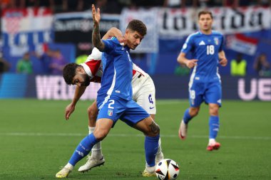 Leipzig, Almanya 24.06.2024: Hırvat Mateo Kovaciç, İtalyan Giovanni Di Lorenzo UEFA EURO 2024 Matchday 3, Hırvatistan ile İtalya arasında Leipzig Stadyumu 'nda oynanan B aşaması futbol karşılaşmasında.