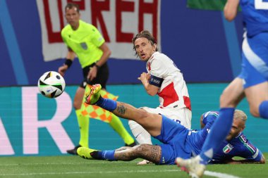 Leipzig, Almanya 24.06.2024: UEFA EURO 2024 Maç sırasında Hırvat Luca Modriç, Hırvatistan ile İtalya arasında Leipzig Stadyumu 'nda oynanan B aşaması futbol karşılaşması..