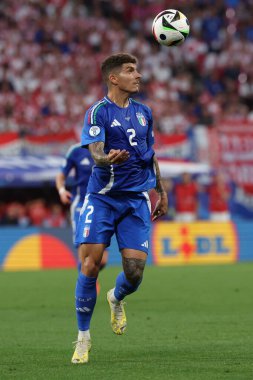 Leipzig, Almanya 24.06.2024: UEFA EURO 2024 Maç sırasında İtalyan Giovanni Di Lorenzo, Hırvatistan ile İtalya arasında Leipzig Stadyumu 'nda oynanan B aşaması futbol karşılaşması..