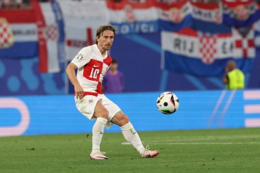 Leipzig, Almanya 24.06.2024: UEFA EURO 2024 Maç sırasında Hırvat Luca Modriç, Hırvatistan ile İtalya arasında Leipzig Stadyumu 'nda oynanan B aşaması futbol karşılaşması..