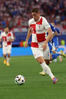 Leipzig, Almanya 24.06.2024: UEFA EURO 2024 Maç sırasında Hırvat Mario Pasaliç, Hırvatistan ile İtalya arasında Leipzig Stadyumu 'nda oynanan B aşaması futbol karşılaşması..