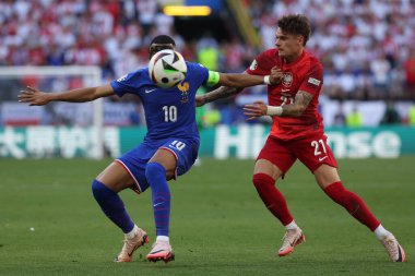 Dortmund , Germany 25.06.2024: Kylian Mbappe of France, Nicola Zalewski of Poland during the UEFA EURO 2024 Matchday 3, group stage D football match between France vs Poland at BVB Stadion Dortmund. clipart