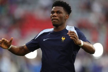 Münih, Almanya 09.07.2024: UEFA EURO 2024 yarı finali öncesinde Fransız Aurelien Tchouameni Münih Futbol Ligi 'nde İspanya ile Fransa arasında oynanan futbol karşılaşması