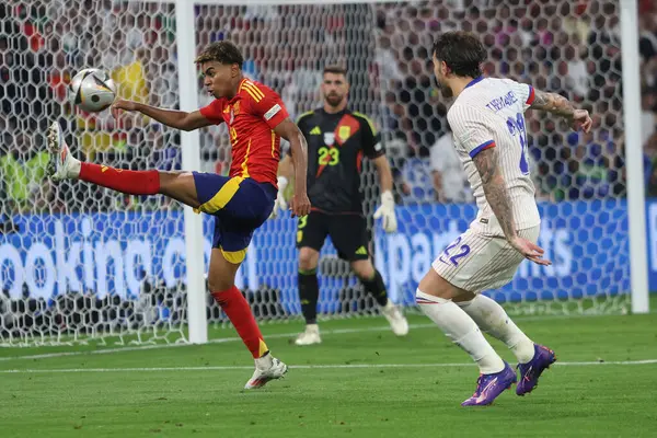 stock image Munich , Germany 09.07.2024: Lamine Yamal of Spain, Theo Hernandez of France  during the UEFA EURO 2024 semi-finals, football match between Spain vs France at Munich Football Allianz Arena