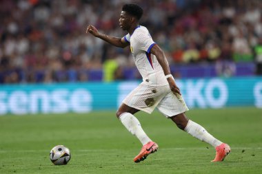 Münih, Almanya 09.07.2024: UEFA EURO 2024 yarı finalleri sırasında Fransız Aurelien Tchouameni, Münih Futbol Ligi 'nde İspanya ile Fransa arasında oynanan futbol karşılaşması
