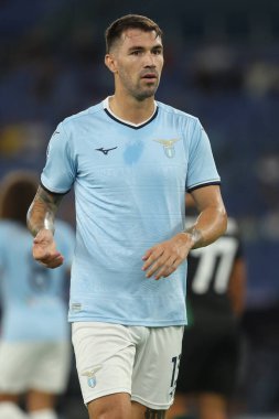 Roma, İtalya 18.08.2024: Lazio 'lu Alessio Romagnoli İtalya Futbol Şampiyonası sırasında Serie A Enilive 2024-2025 karşılaşmasında SS Lazio - Venezia FC karşılaşması 18 Ağustos 2024' te Roma 'daki Stadio Olimpico' da gerçekleşti..