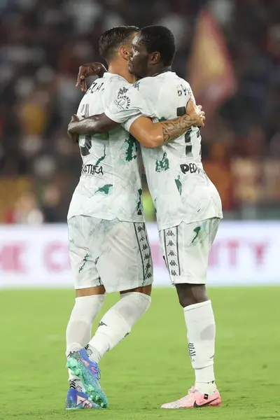 stock image Rome, Italy 25.08.2024 : Emmanuel Gyasi of Empoli score the goal and celebrate with Giuseppe Pezzella of Empoli during Italian football championship Serie A Enilive 2024-2025  match AS Roma Vs Empoli FC at Stadio Olimpico in Rome on August 25, 2024.