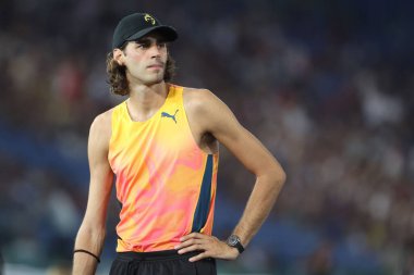 Rome, Italy 30.08.2024 : Gianmarco Tamberi and Marcell Jacobs after 100 m Men in athletic competition Golden Gala Pietro Mennea Rome 2024 - Diamond League at Stadio Olimpico in Rome on August 30, 2024. clipart