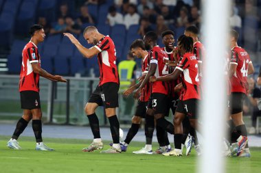 Roma, İtalya 31.08.2024: Milanlı Strahinja Pavloviç, İtalya futbol şampiyonası Serie A Enilive 2024-2025 karşılaşmasında golü atıp takımla birlikte kutladı. 31 Ağustos 2024 'te Roma' daki Stadio Olimpico 'da SS Lazio' ya karşı AC Milan maçı yapıldı..