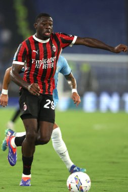 Roma, İtalya 31.08.2024: İtalya Futbol Şampiyonası sırasında Milan 'dan Yusuf Fofana Serie A Enilive 2024-2025 karşılaşmasında SS Lazio, AC Milan' a karşı 31 Ağustos 2024 'te Roma' da Stadio Olimpico 'da oynanan karşılaşma..