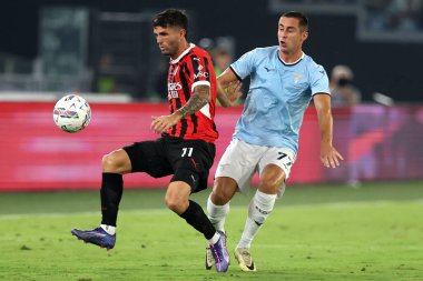 Roma, İtalya 31.08.2024: Milanlı Christian Pulisiç, İtalyan futbolcu Adam Marusiç İtalya futbol şampiyonası Serie A Enilive 2024-2025 karşılaşmasında SS Lazio ile AC Milan arasında 31 Ağustos 2024 'te Roma' daki Stadio Olimpico 'da oynanan karşılaşma..