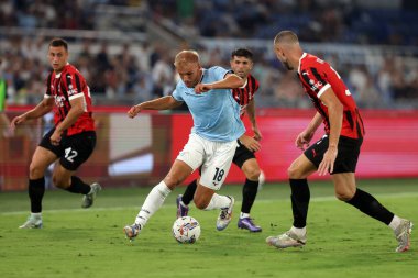 Roma, İtalya 31.08.2024: Lazio 'lu Gustav Isaksen İtalyan futbol şampiyonluğu sırasında Serie A Enilive 2024-2025 karşılaşmasında SS Lazio, AC Milan' a karşı 31 Ağustos 2024 'te Roma' da Stadio Olimpico 'da oynanan karşılaşma..