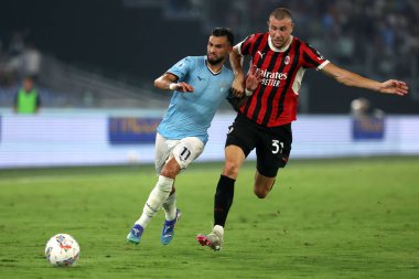 Roma, İtalya 31.08.2024: Lazio 'dan Taty Castellanos, İtalya futbol şampiyonluğu sırasında Milan' dan Strahinja Pavloviç Serie A Enilive 2024-2025 karşılaşmasında SS Lazio, AC Milan 'a karşı 31 Ağustos 2024' te Roma 'da Stadio Olimpico' da oynanan karşılaşma..