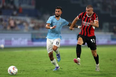 Roma, İtalya 31.08.2024: Lazio 'dan Taty Castellanos, İtalya futbol şampiyonluğu sırasında Milan' dan Strahinja Pavloviç Serie A Enilive 2024-2025 karşılaşmasında SS Lazio, AC Milan 'a karşı 31 Ağustos 2024' te Roma 'da Stadio Olimpico' da oynanan karşılaşma..