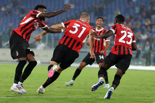 Rome, Italy 31.08.2024 : Strahinja Pavlovic of Milan score the goal and celebrate with the team during Italian football championship Serie A Enilive 2024-2025  match SS Lazio vs AC Milan at Stadio Olimpico in Rome on August 31, 2024.