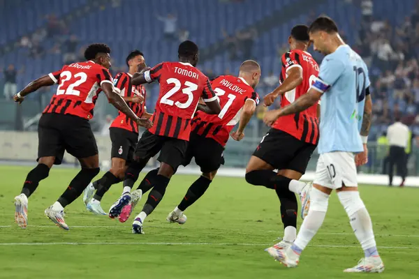 Roma, İtalya 31.08.2024: Milanlı Strahinja Pavloviç, İtalya futbol şampiyonası Serie A Enilive 2024-2025 karşılaşmasında golü atıp takımla birlikte kutladı. 31 Ağustos 2024 'te Roma' daki Stadio Olimpico 'da SS Lazio' ya karşı AC Milan maçı yapıldı..