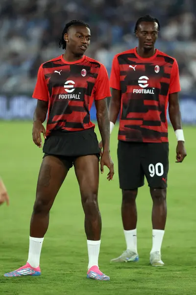 stock image Rome, Italy 31.08.2024 : Rafael Leao of Milan,  Tammy Abraham of Milan during warm up before Italian football championship Serie A Enilive 2024-2025  match SS Lazio vs AC Milan at Stadio Olimpico in Rome on August 31, 2024.