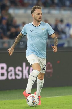 Roma, İtalya 16.09.2024: Lazio 'lu Manuel Lazzari İtalyan futbol şampiyonluğu sırasında Serie A Enilive 2024-2025 karşılaşmasında SS Lazio Hellas Verona' ya karşı Eylül 2024 'te Roma' da Stadio Olimpico 'da oynanan karşılaşma..