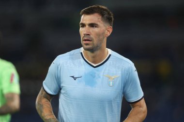 Roma, İtalya 16.09.2024: Lazio 'lu Alessio Romagnoli İtalya futbol şampiyonluğu sırasında Serie A Enilive 2024-2025 karşılaşmasında SS Lazio Hellas Verona' ya karşı Eylül 2024 'de Roma' da Stadio Olimpico 'da oynanan karşılaşma..