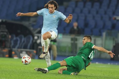 Roma, İtalya 28.11.2024: Lazio 'dan Matteo Guendouzi, 2024-2025 Uefa Avrupa Ligi' nde Ludogorets 'ten Ivayalo Chochev, 5. gün, SS Lazio' ya karşı Ludogorets Razgrad arasındaki futbol karşılaşması Roma Olimpiyat Stadyumu 'nda gerçekleşti..