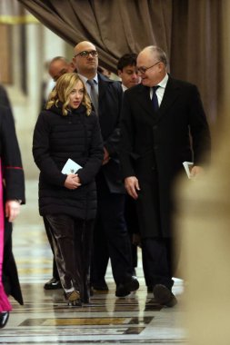 Vatican City, Italy 24.12.2024 : President of Italian Council Giorgia Meloni, Mayor of Rome Roberto Gualtieri, enter in St. Peter's Basilica for the Jubilee 2025, celebrates Christmas Mass in front of thousands of faithful, in St. Peter's Basilica Va clipart