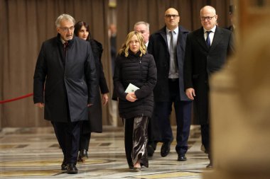 Vatican City, Italy 24.12.2024 : President of Italian Council Giorgia Meloni, Mayor of Rome Roberto Gualtieri, enter in St. Peter's Basilica for the Jubilee 2025, celebrates Christmas Mass in front of thousands of faithful, in St. Peter's Basilica Va clipart