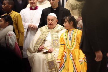 Vatican City, Italy 24.12.2024 : Pope Francis he goes away in a wheelchair and blesses and greets the faithful at the end in St. Peter's Basilica for the Jubilee 2025, celebrates Christmas Mass in front of thousands of faithful, in St. Peter's Basili clipart