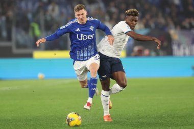 Rome, Italy 10.01.2025 : Van der Brempt of Como, Fisayo Dele-Bashiru of Lazio during Italian football championship Serie A Enilive 2024-2025  match SS Lazio vs Como 1907 at Stadio Olimpico in Rome. clipart