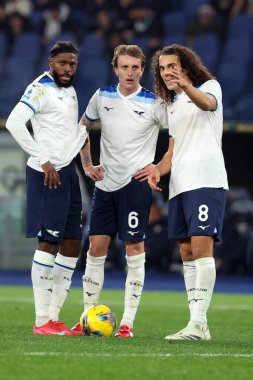 Rome, Italy 10.01.2025 : Nuno Tavares of Lazio, Nicolo Rovella of Lazio, Matteo Guendouzi of Lazio during Italian football championship Serie A Enilive 2024-2025  match SS Lazio vs Como 1907 at Stadio Olimpico in Rome. clipart