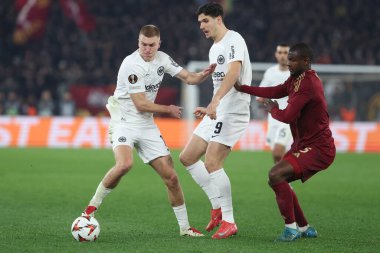 Rome, Italy 30.01.2025:  Rasmus Kristensen of Eintracht Frankfurt, Igor Matanovic of Eintracht Frankfurt, Evan Ndicka of Roma during the Uefa Europa League 2024-2025, football match between AS Roma vs Eintracht Frankfurt at Olympic Stadium in Rome. clipart