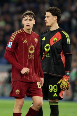 Rome, Italy 02.02.2025 : Niccolo Pisilli of Roma, Mile Svilar of Roma during Italian football championship Serie A Enilive 2024-2025  match AS Roma vs SSC Napoli at Stadio Olimpico in Rome on February 2, 2025. clipart