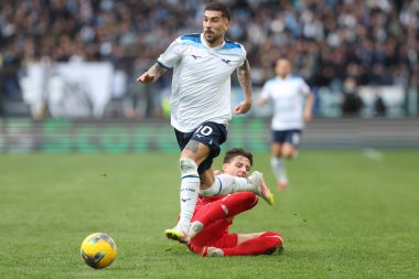 Rome, Italy 9.02.2025 : Kacper Urbanski of Monza, Mattia Zaccagni of Lazio  during Italian football championship Serie A Enilive 2024-2025  match SS Lazio vs AC Monza at Stadio Olimpico in Rome. clipart