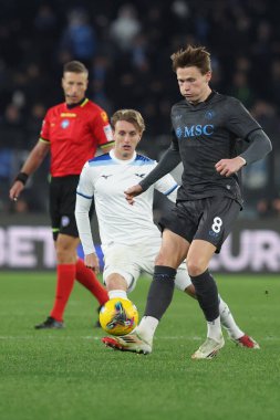 Rome, Italy 15.02.2025 : Nicolo Rovella of Lazio, Scott Mctominay of Napoli during Italian football championship Serie A Enilive 2024-2025  match SS Lazio vs SSC Napoli at Olympic stadium  in Rome. clipart