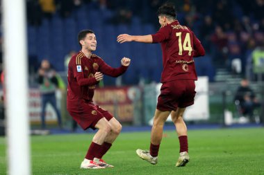 Rome, Italy 24.02.2025: Matias Soule of Roma celebrate scorre with Eldor Shomurodov of Roma during Italian football championship Serie A Enilive 2024-2025  match AS Roma vs AC Monza at Stadio Olimpico in Rome. clipart