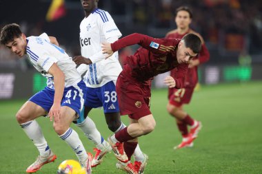 Rome, Italy 2.03.2025 : Alex Valle Gomez of Como, Matias Soule of Roma  during Italian football championship Serie A Enilive 2024-2025  match AS Roma vs Como 1907 at Stadio Olimpico in Rome clipart