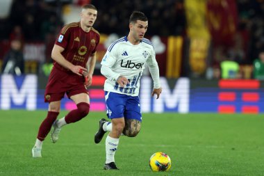 Rome, Italy 2.03.2025 :  Artem Dovbyk of Roma, Gabriel Strefezza of Como during Italian football championship Serie A Enilive 2024-2025  match AS Roma vs Como 1907 at Stadio Olimpico in Rome clipart