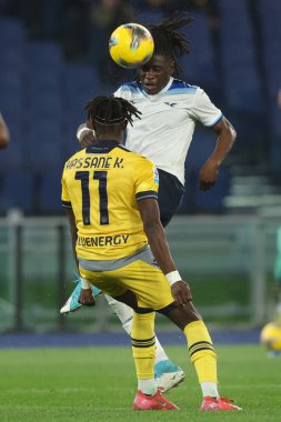 Roma, İtalya 10.03.2025: Lazio 'lu Loum Tchaouna, Udinese' li Hassane Kamara İtalyan futbol şampiyonası Serie A Enilive 2024-2025 karşılaşmasında Roma 'daki Stadio Olimpico' da SS Lazio 'ya karşı Udinese Calcio karşılaşmasında görev aldı.