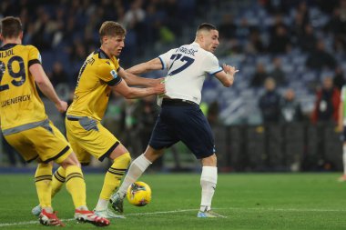 Roma, İtalya 10.03.2025: Udinese 'li Thoma Kristensen, Lazio' lu Adam Marusiç İtalyan futbol şampiyonası Serie A Enilive 2024-2025 karşılaşmasında Roma 'daki Stadio Olimpico' da SS Lazio Udinese Calcio 'ya karşı