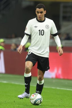 Milan, İtalya 20.03.2025: Almanya 'dan Jamal Musiala Uefa Milletler Ligi 2025, çeyrek final, İtalya ile Almanya arasındaki futbol maçı Milano' daki Giuseppe Meazza Stadyumu 'nda görüldü..