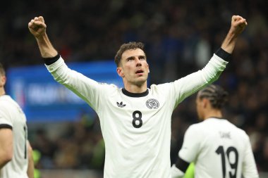 Milan, İtalya 20.03.2025: Alman Leon Goretzka golü attı ve Uefa Milletler Ligi 2025 çeyrek final, İtalya ile Almanya arasındaki futbol maçı Milano 'daki Giuseppe Meazza Stadyumu' nda kutladı..