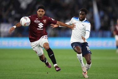 Roma, İtalya 31.03.2025: Torino 'dan Saul Coco, İtalya futbol şampiyonluğu sırasında Lazio' dan Boulaye Dia Serie A Enilive 2024-2025 karşılaşmasında SS Lazio, Roma 'daki Stadio Olimpico' da Torino 'ya karşı