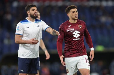 Roma, İtalya 31.03.2025: Lazio 'lu Samuel Gigot, İtalya futbol şampiyonluğu sırasında Torino' lu Che Adams Serie A Enilive 2024-2025 karşılaşmasında SS Lazio, Roma 'daki Stadio Olimpico' da Torino FC 'ye karşı