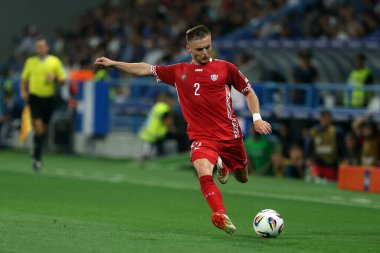 Reggio Emilia, İtalya 9 Haziran 2025: Moldavyalı Oleg Reabciuk 2026 Dünya Kupası ön eleme karşılaşmasında İtalya ile Moldova arasındaki Reggio Emilia stadyumunda, Stadio Citt del Tricolore Stadyumu. 