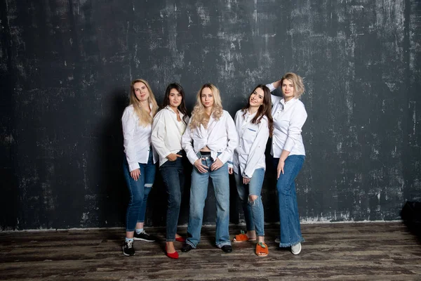 Young Attractive Women White Shirts Jeans Posing Studio — Stock Photo, Image