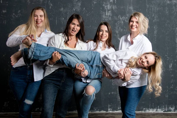 Young Attractive Women White Shirts Jeans Posing Studio — Foto de Stock