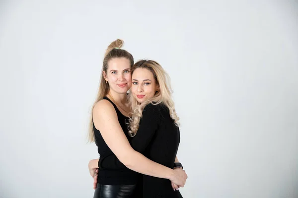 Two Young Women Black Clothes Posing White Background — Stockfoto
