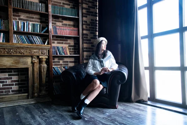 Portrait Woman Wearing Beret Sitting Chair Books — 图库照片