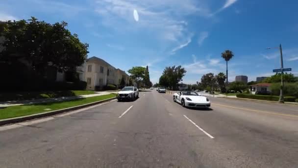 Los Angeles Olympic Blvd Eastbound Taustakuva Fairfax Ave Driving Plate — kuvapankkivideo