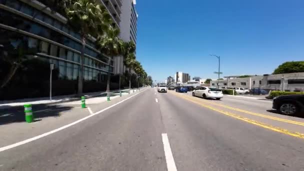 Beverly Hills Santa Monica Blvd Takanäkymä Wilshire Blvd Ajolevyllä Kaliforniassa kuvapankkivideo